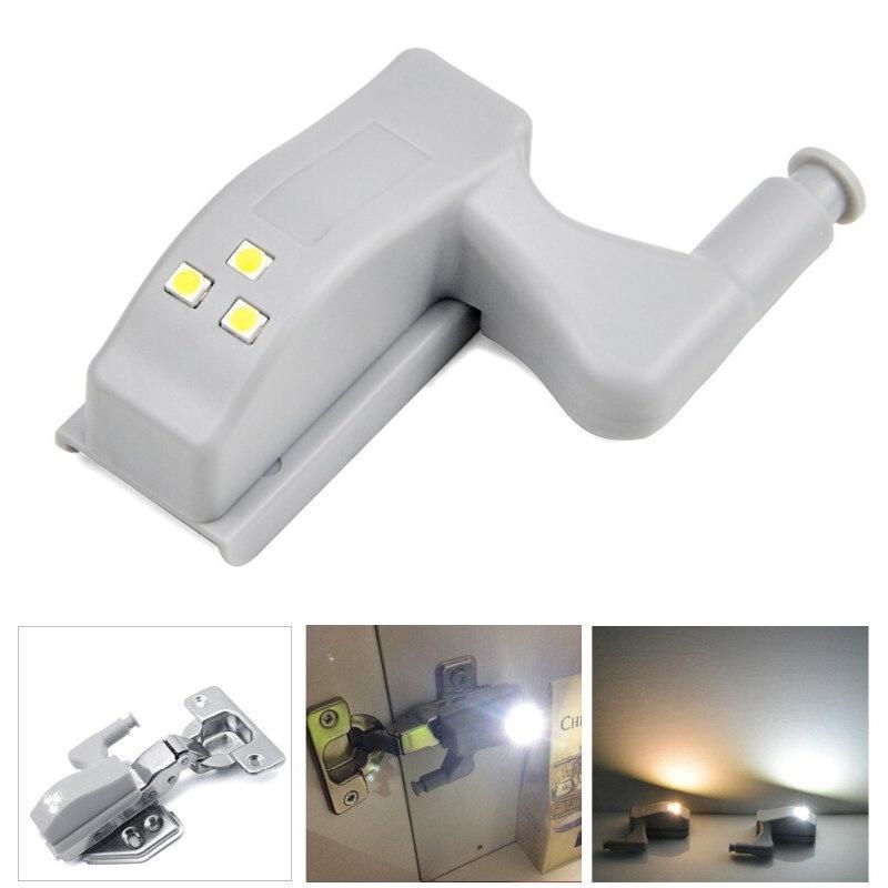 Kitchen accessories: Wireless Smart Cabinet Hinge LED Sensor Lights brightening a pantry shelf