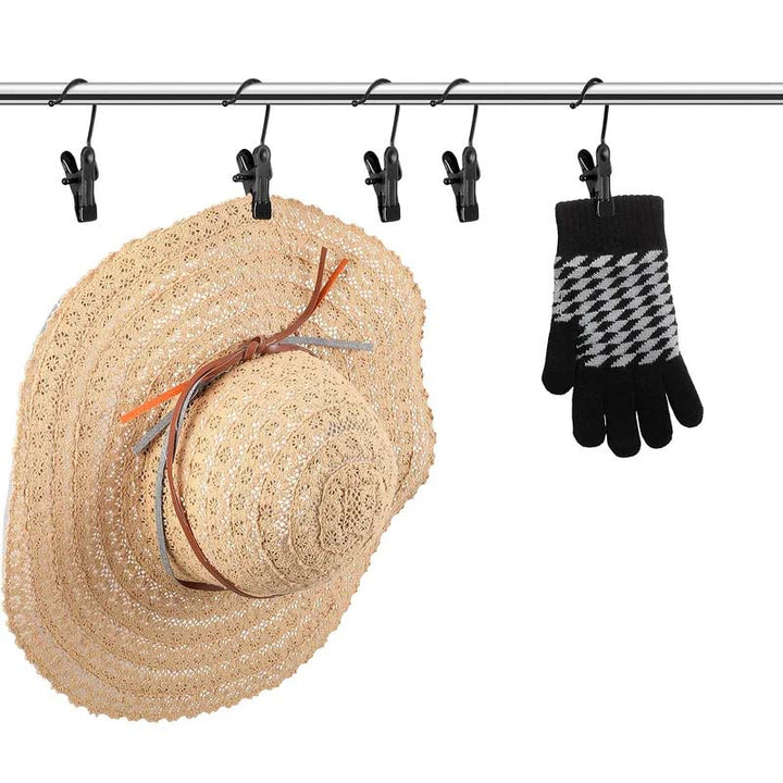 Universal hanging clips for travel & home, 10-pack, shown organizing clothes in a suitcase