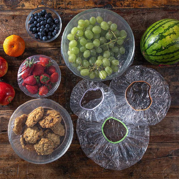 Stack of 100 reusable elastic food storage covers, ideal for household kitchen organization