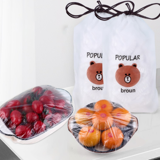 100-pack universal clear disposable food storage covers stretch to fit various bowls and plates, keeping food fresh.