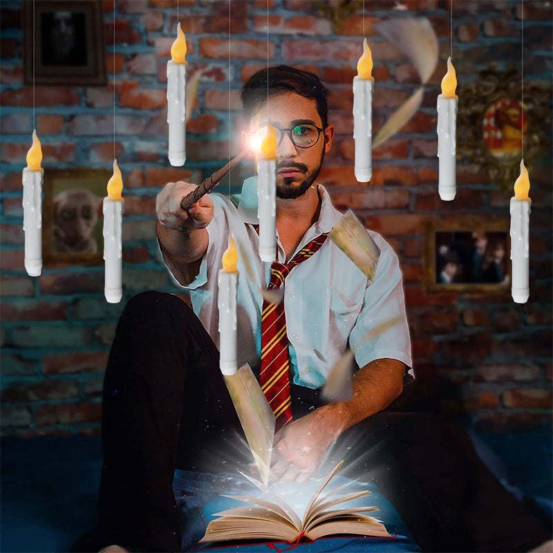 Floating LED taper candles in a 12-pack, controlled by a remote wand for easy ambiance