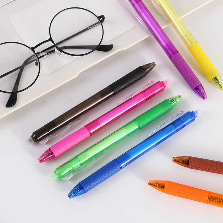 Close-up of 12 multi-color erasable gel pens with caps, essential school and office supplies for creatives