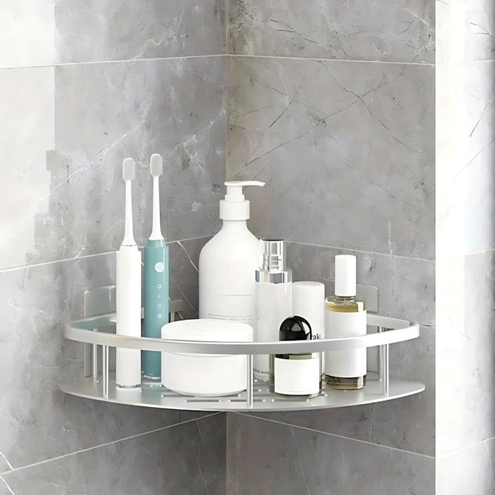 Modern 1-tier rustproof metal shower shelf for sleek bathroom storage. Wall-mounted caddy holds shampoo & soap.
