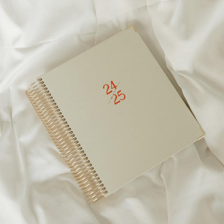 2024-2025 Comprehensive Daily & Teacher Planner with colorful pages and organizational tabs.