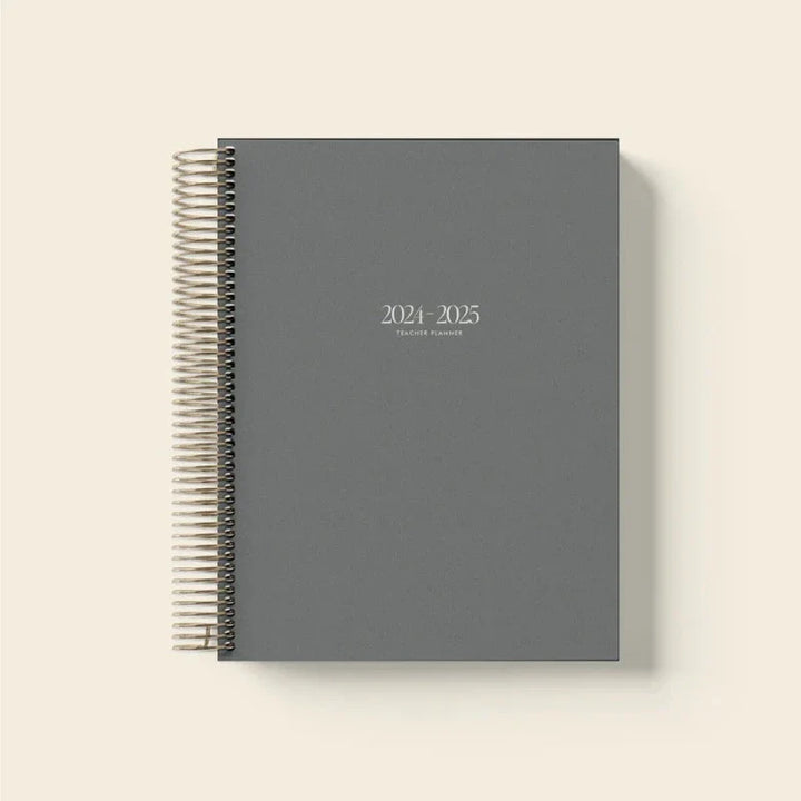Minimalist design 2024-2025 daily planner open to a goal-setting page.