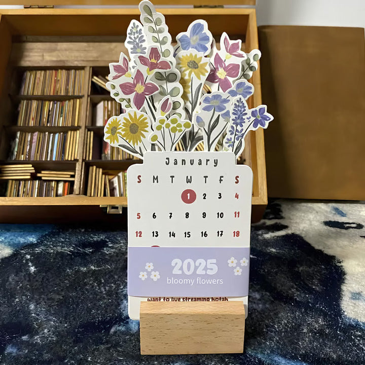 Close-up of Bloomy Flowers Desk Calendar showing monthly layout & botanical art