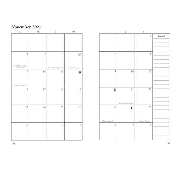 Witch's hand holding open the 2025 Witches' Datebook, a magical planner and journal