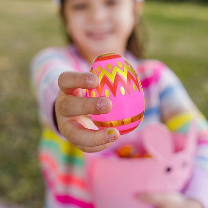 Display of 24 prefilled Easter eggs for kids, highlighting the fun squeeze toys within, holiday party ready.