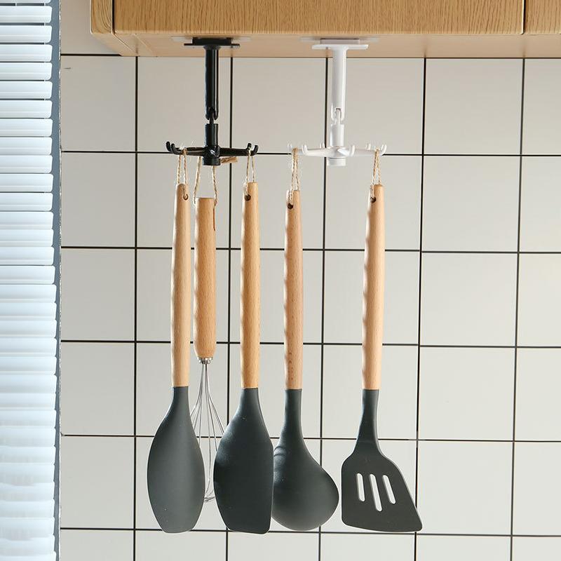 Universal folding utility hook in white, ideal for kitchen storage and houseware organization, rotating design