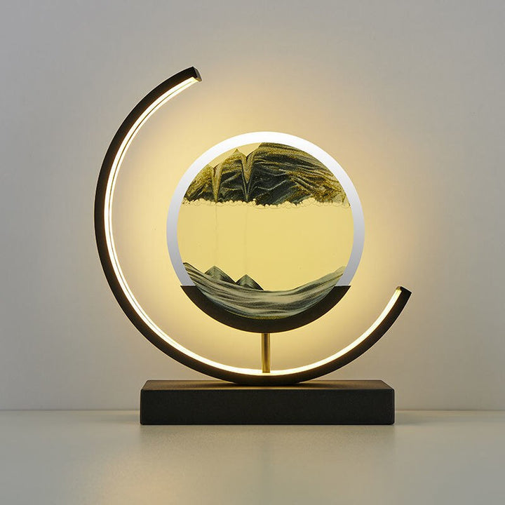 "3D Sand Shell Table Lamp emitting soothing green LED light; modern art-inspired design with dynamic sand patterns."