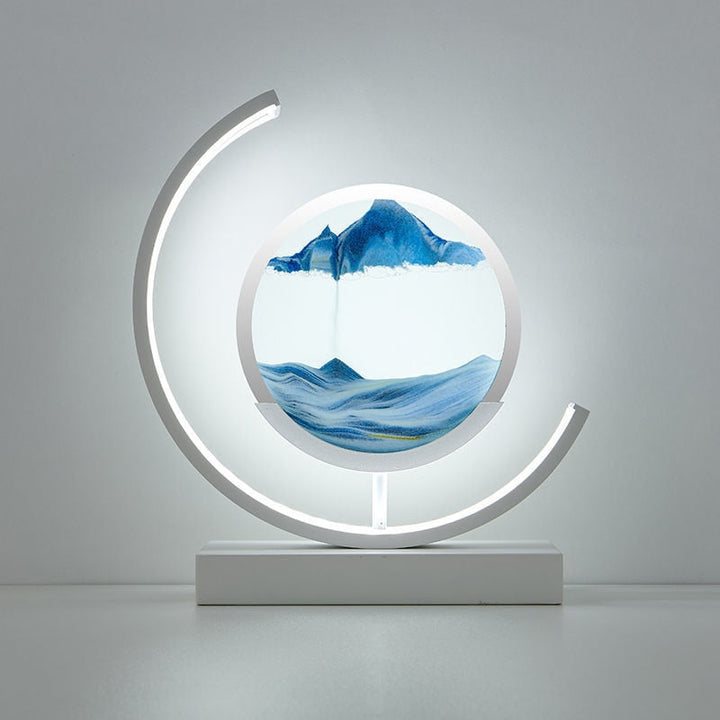 "3D Sand Shell Table Lamp emitting soothing green LED light; modern art-inspired design with dynamic sand patterns."