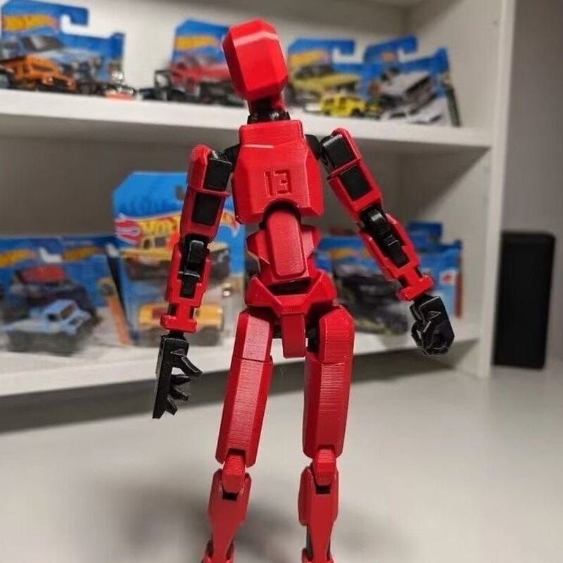 Gift-wrapped box containing a unisex 3D printed multi-jointed robot action figure