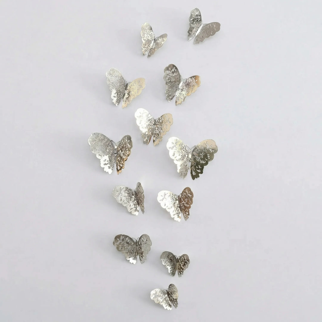 Variety of sizes in the 3D wall butterflies decor set, featuring both gold and silver metallic accents.