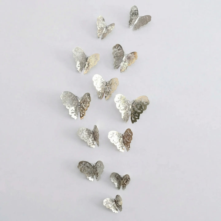 Variety of sizes in the 3D wall butterflies decor set, featuring both gold and silver metallic accents.
