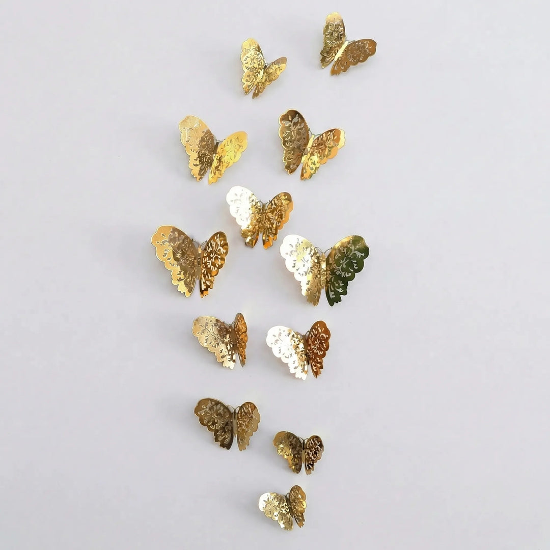 Gold & silver 3D butterflies wall decor catching light, adding a sparkling touch to any room decoration.