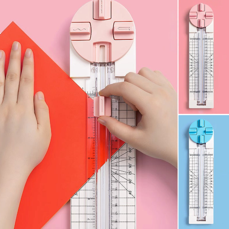 Paper cutter displaying measurement guides and transparent cutting bar for precision