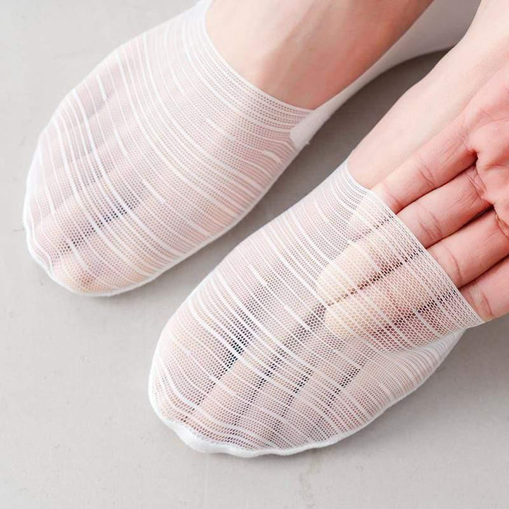 Detail shot of the anti-slip silicone grip on the heel of a no-show ice silk ankle sock