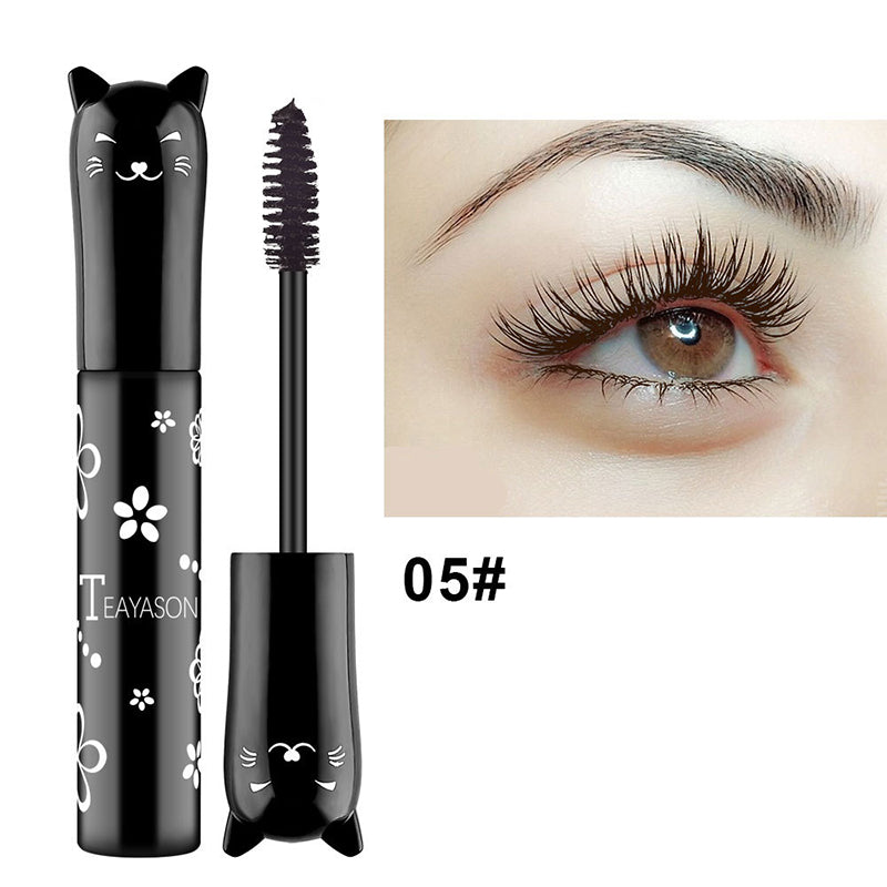 Vibrant 5D Lengthening & Curling Mascara on a makeup vanity, ready for use, beauty product