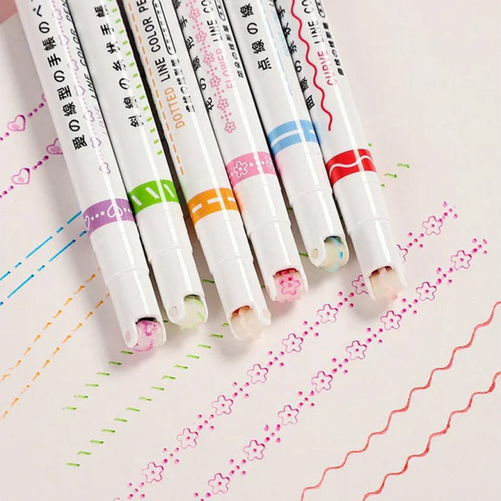 Hand holding a Dual Tip Curve Line Pen, making a decorative curve line on paper, art supplies