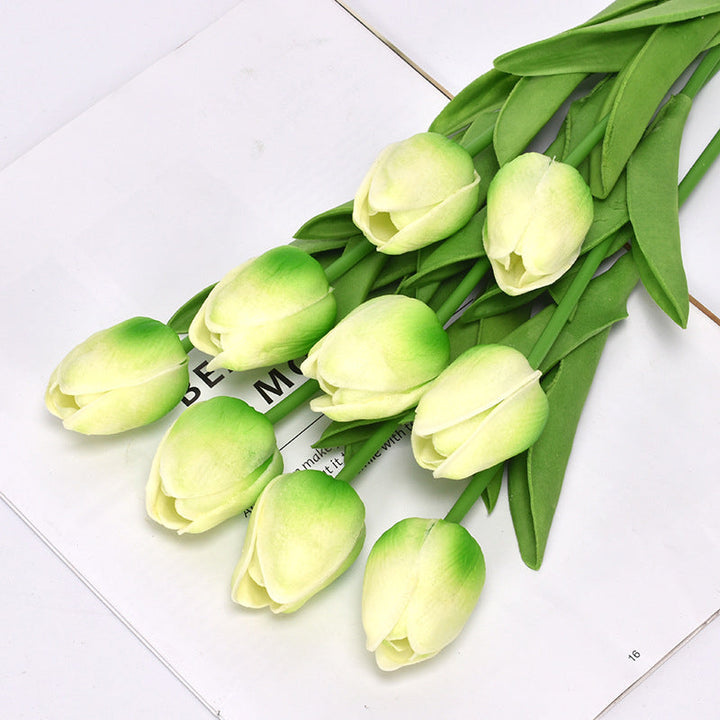 Brightly colored artificial tulips, adding cheer to any interior or exterior space