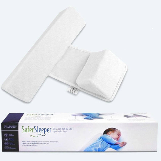 Anti-Roll Adjustable Memory Foam Baby Pillow in Pink, side-sleeper support, gentle and breathable design for newborns.