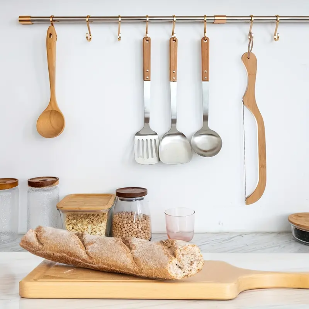 "Bamboo-handled stainless steel bread bow cutter, elegant design, perfect for slicing fresh bread with precision and style."
