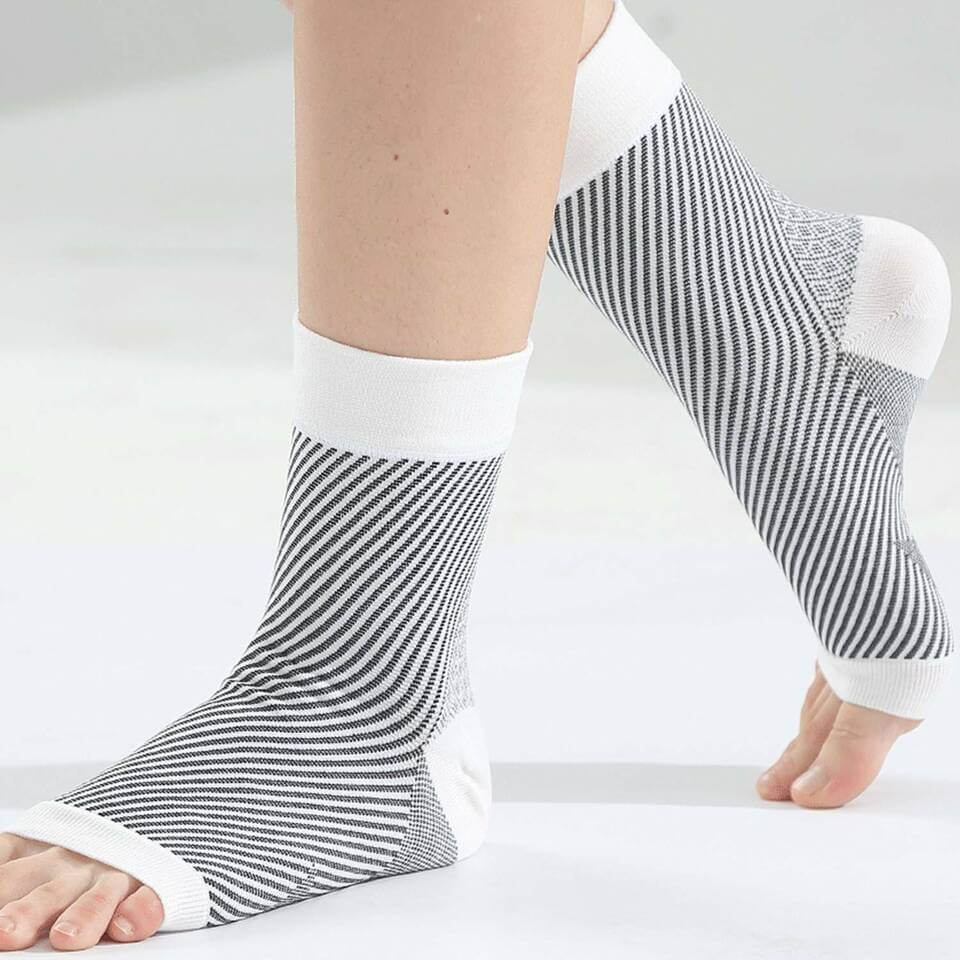 "Black unisex SootheFlex compression sport socks, breathable, seamless design, perfect for athletic performance support."
