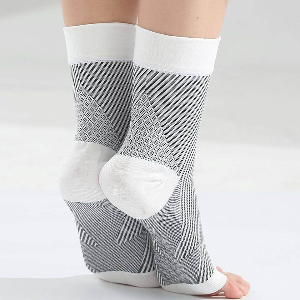 "Black unisex SootheFlex compression sport socks, breathable, seamless design, perfect for athletic performance support."