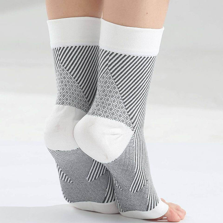 "Black unisex SootheFlex compression sport socks, breathable, seamless design, perfect for athletic performance support."