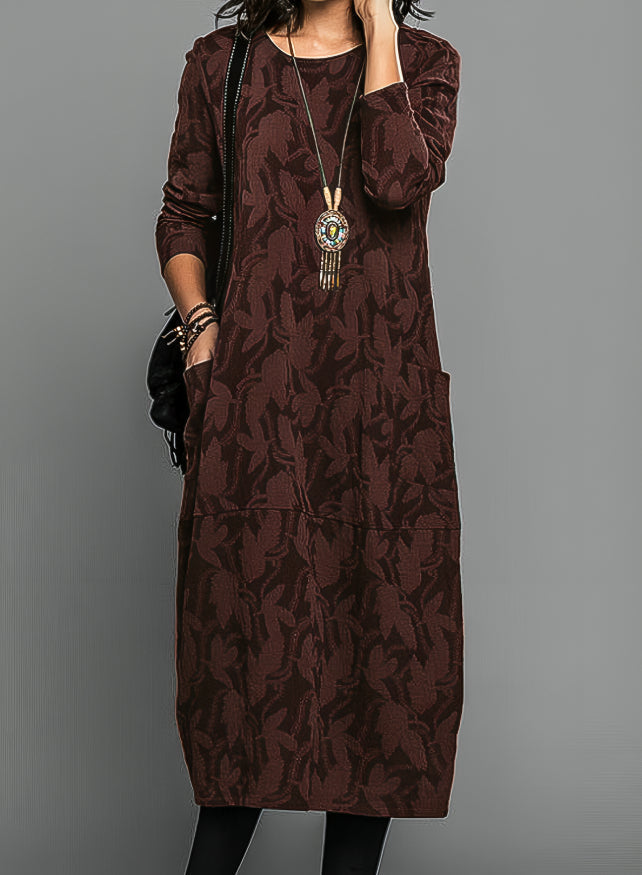 "Burgundy winter dress with chic prints and pockets, elegant design for casual and formal occasions, cozy fabric."