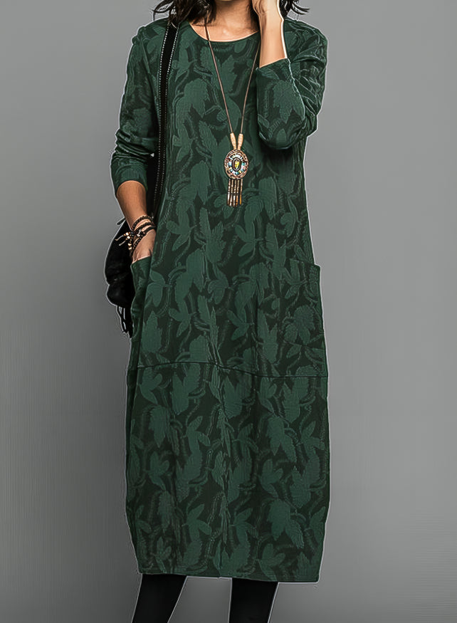 "Burgundy winter dress with chic prints and pockets, elegant design for casual and formal occasions, cozy fabric."