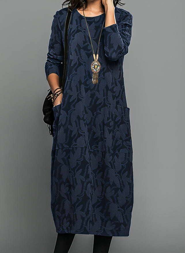 "Burgundy winter dress with chic prints and pockets, elegant design for casual and formal occasions, cozy fabric."
