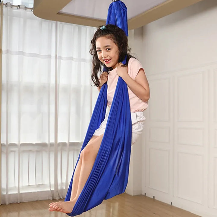 "Calming therapy hammock for children in soothing colors, enhances relaxation, emotional calmness, and motor skills."