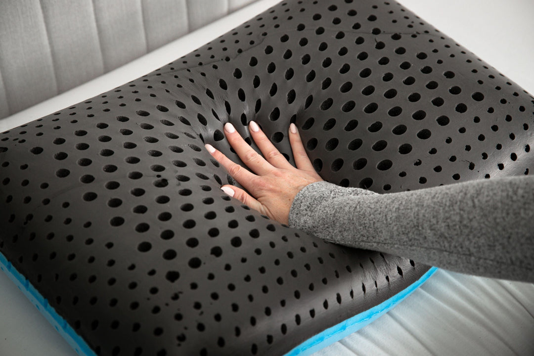 CarbonIce Pillow for all-season comfort with dual memory foam, featuring cooling tech and orthopedic design for restful sleep