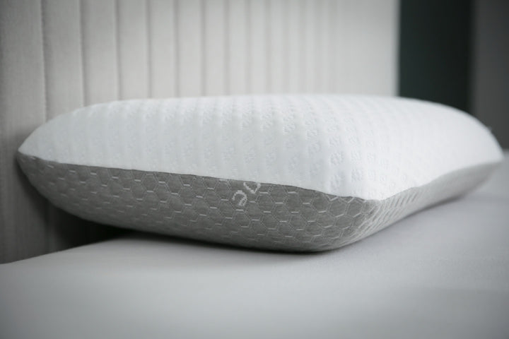 CarbonIce Pillow for all-season comfort with dual memory foam, featuring cooling tech and orthopedic design for restful sleep