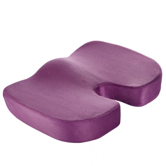 "Coccyx cushion with U-shape cutout, gray memory foam for tailbone pain relief, ergonomic design, enhances sitting comfort."