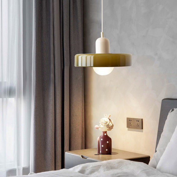 "Colourful glass pendant lamp in Bauhaus style featuring red, green, pink, and yellow stained glass for artistic decor."