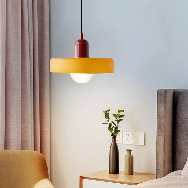 "Colourful glass pendant lamp in Bauhaus style featuring red, green, pink, and yellow stained glass for artistic decor."