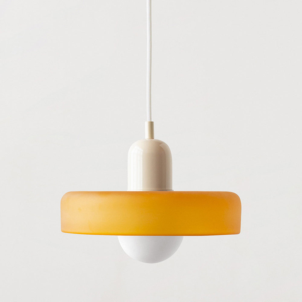 "Colourful glass pendant lamp in Bauhaus style featuring red, green, pink, and yellow stained glass for artistic decor."