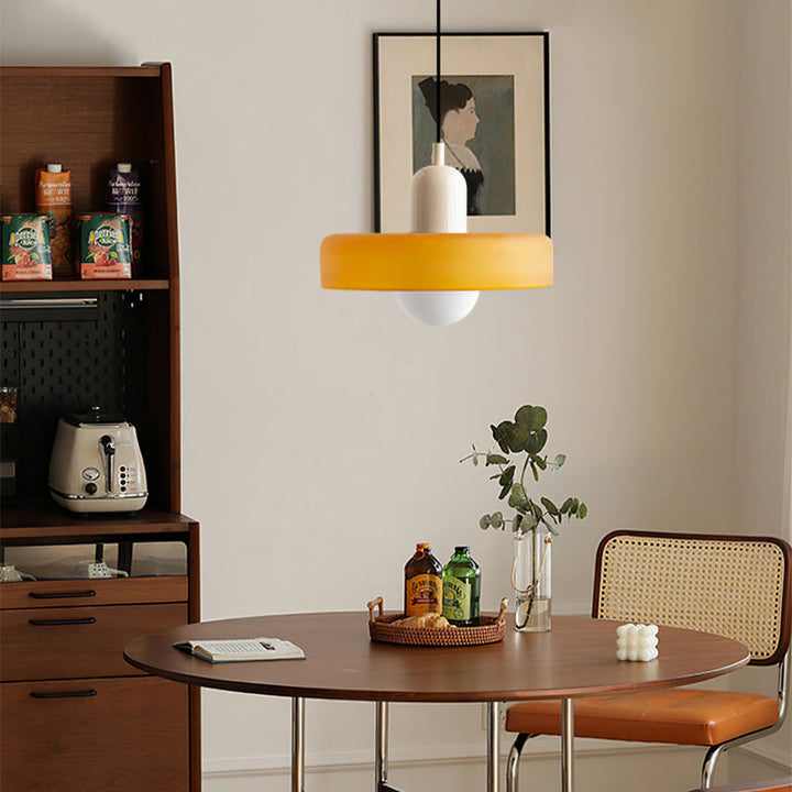 "Colourful glass pendant lamp in Bauhaus style featuring red, green, pink, and yellow stained glass for artistic decor."