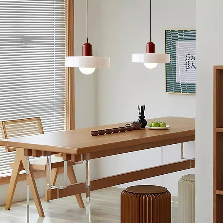 "Colourful glass pendant lamp in Bauhaus style featuring red, green, pink, and yellow stained glass for artistic decor."