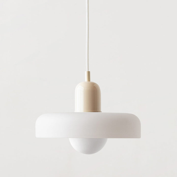 "Colourful glass pendant lamp in Bauhaus style featuring red, green, pink, and yellow stained glass for artistic decor."