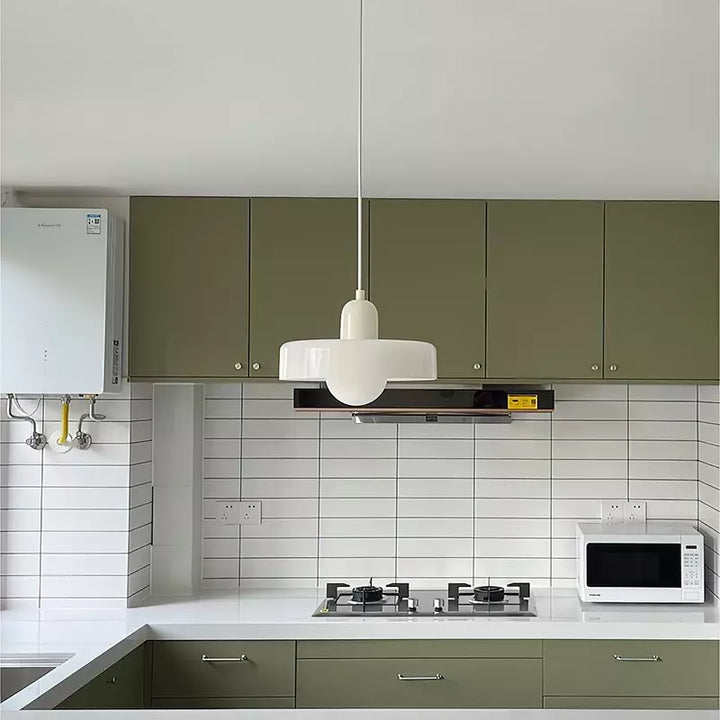 "Colourful glass pendant lamp in Bauhaus style featuring red, green, pink, and yellow stained glass for artistic decor."
