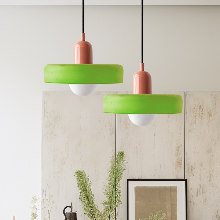 "Colourful glass pendant lamp in Bauhaus style featuring red, green, pink, and yellow stained glass for artistic decor."