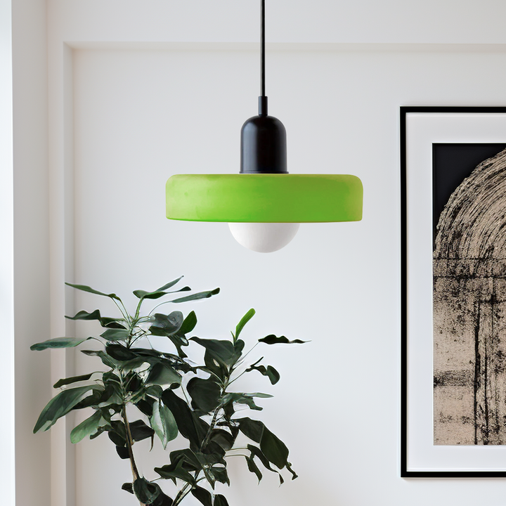 "Colourful glass pendant lamp in Bauhaus style featuring red, green, pink, and yellow stained glass for artistic decor."