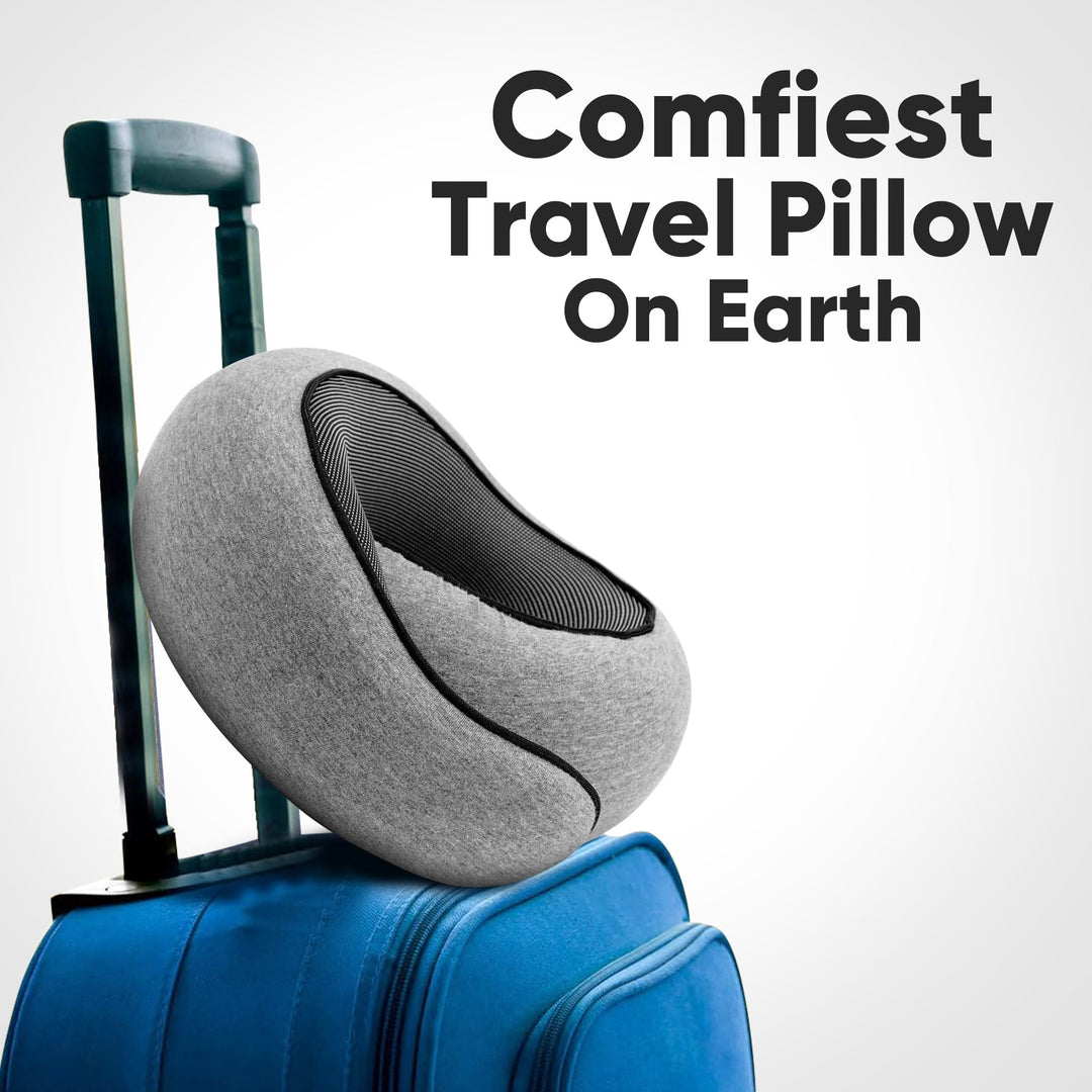 Comfortable travel neck pillow in black, breathable fabric, ergonomic design for neck support, lightweight and portable.