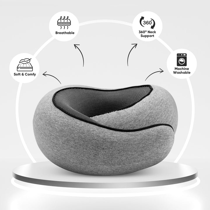 Comfortable travel neck pillow in black, breathable fabric, ergonomic design for neck support, lightweight and portable.