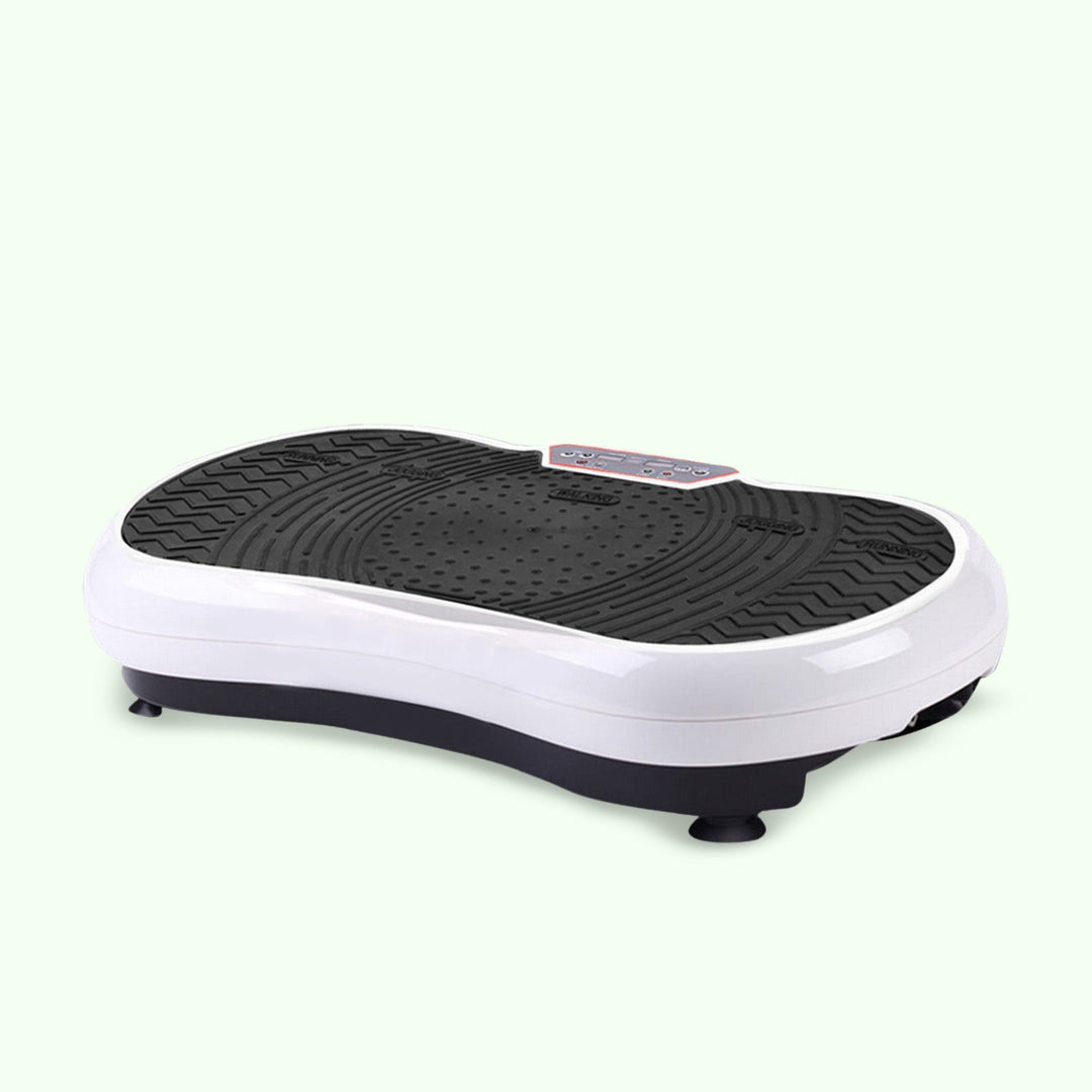 Compact home vibration exercise platform in black with detachable resistance bands, non-slip surface, and remote control.