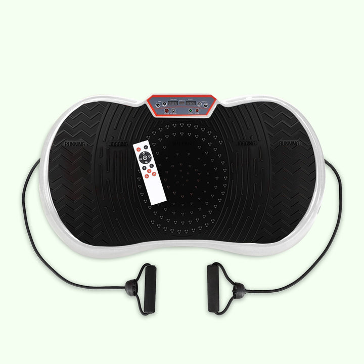 Compact home vibration exercise platform in black with detachable resistance bands, non-slip surface, and remote control.