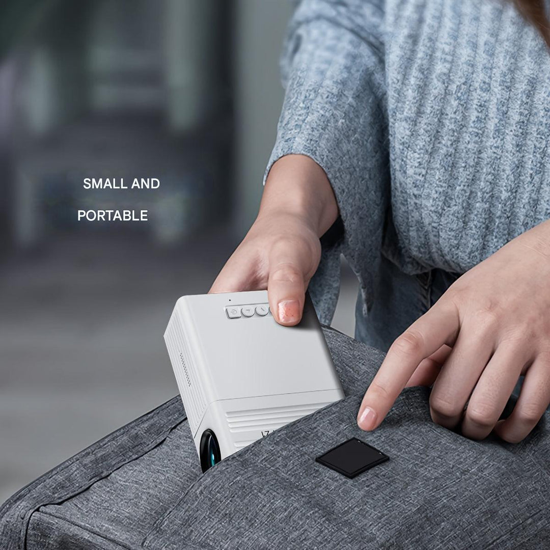 "Compact portable mini projector with 3000 lumens, ideal for vibrant indoor and outdoor cinema experiences, features USB, HDM